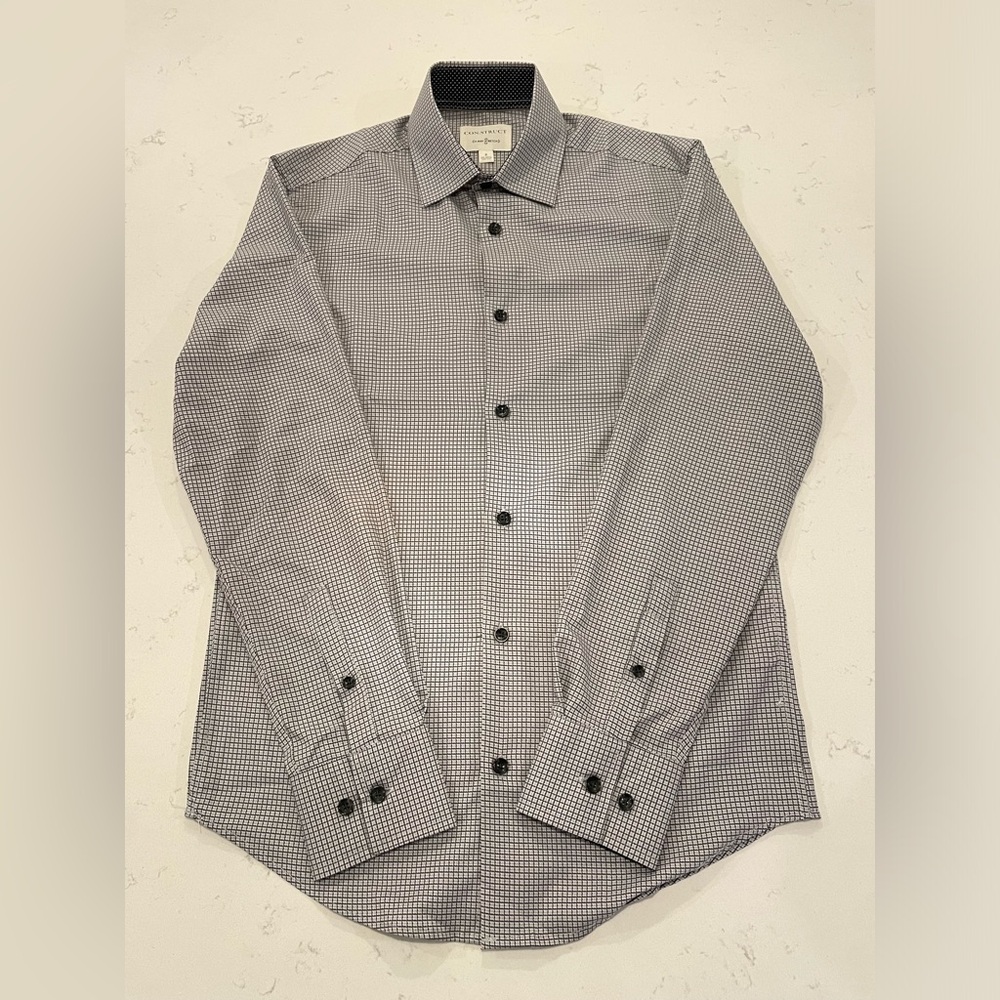 Construct men’s long sleeve button down shirt.